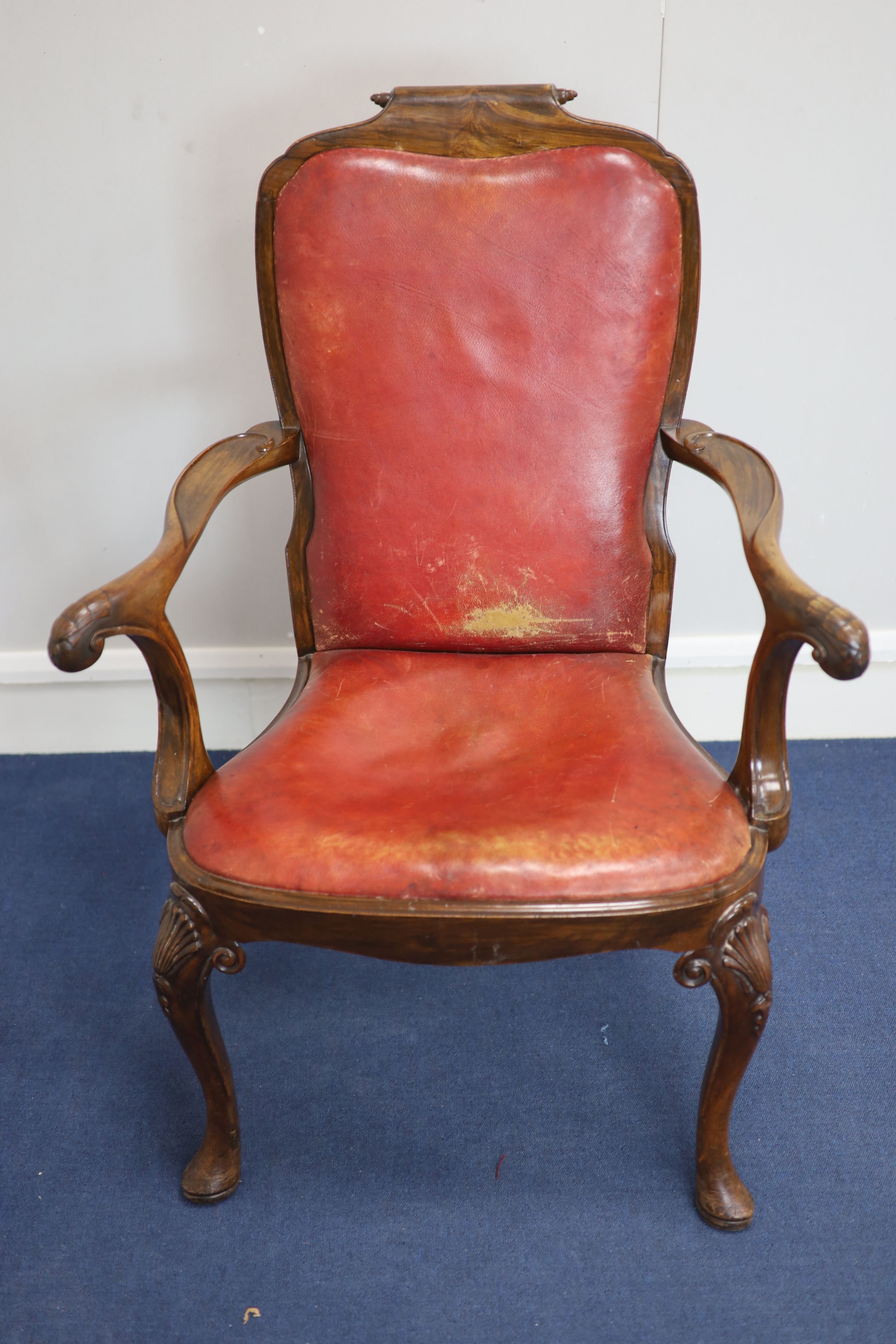 A set of four George I style walnut armchairs, first quarter 20th century,